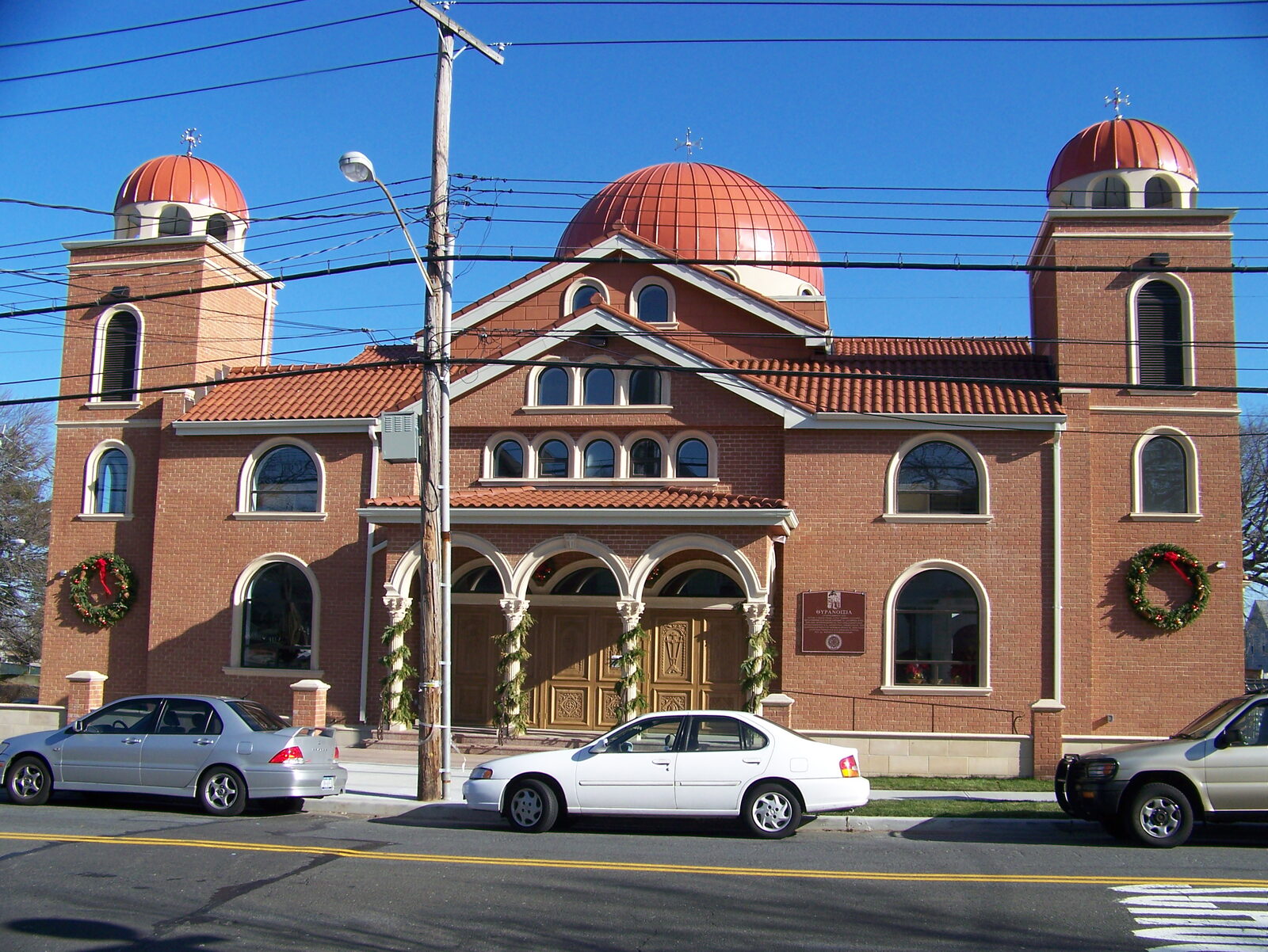 Domed Byzantine-style building with clay tile roof